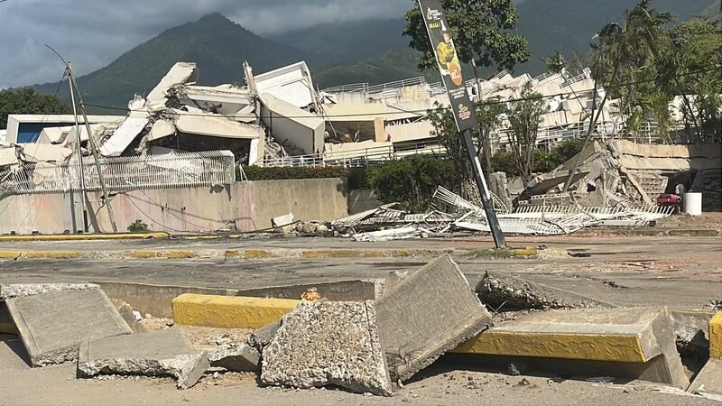 Rubble and broken concrete at a damaged building site.